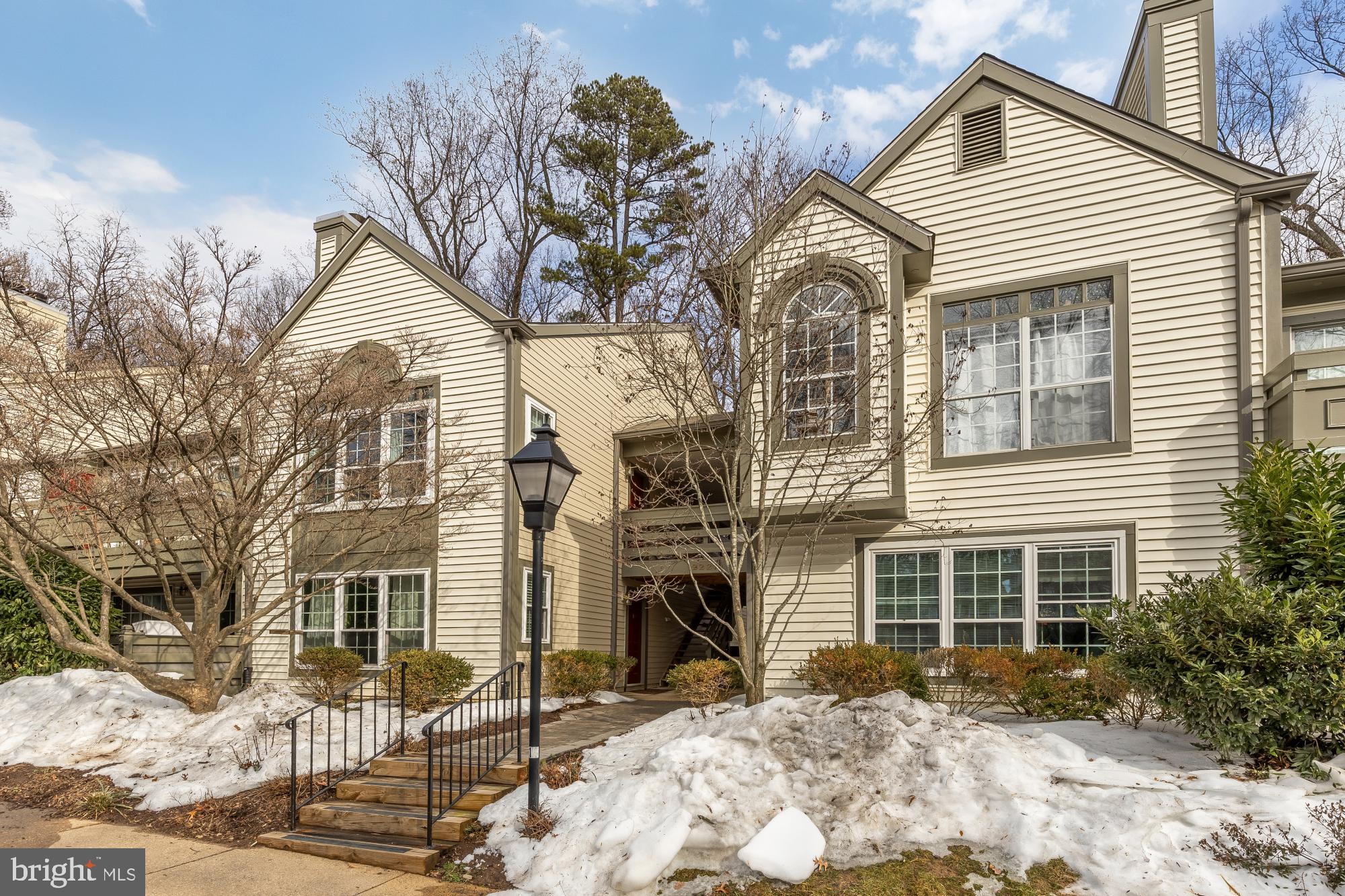 2221 Lovedale Lane, Unit 202B Reston, VA 20191 - Photo 2 of 27 a front view of a house
