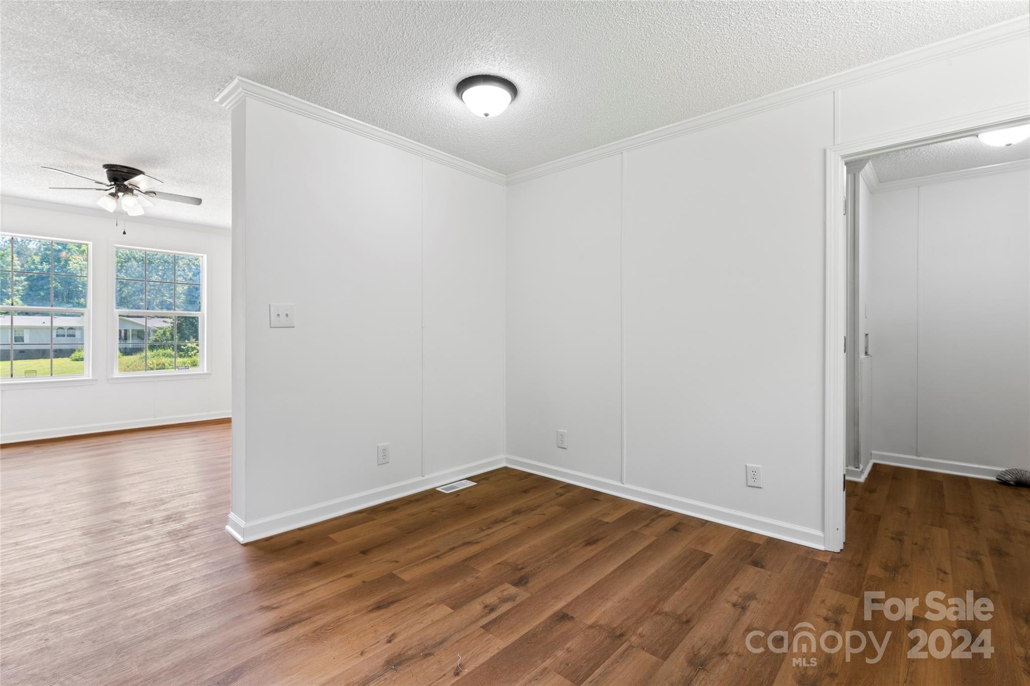669 Ross Road Lincolnton, NC 28092 - Photo 17 of 30 a view of a room with wooden floor and window