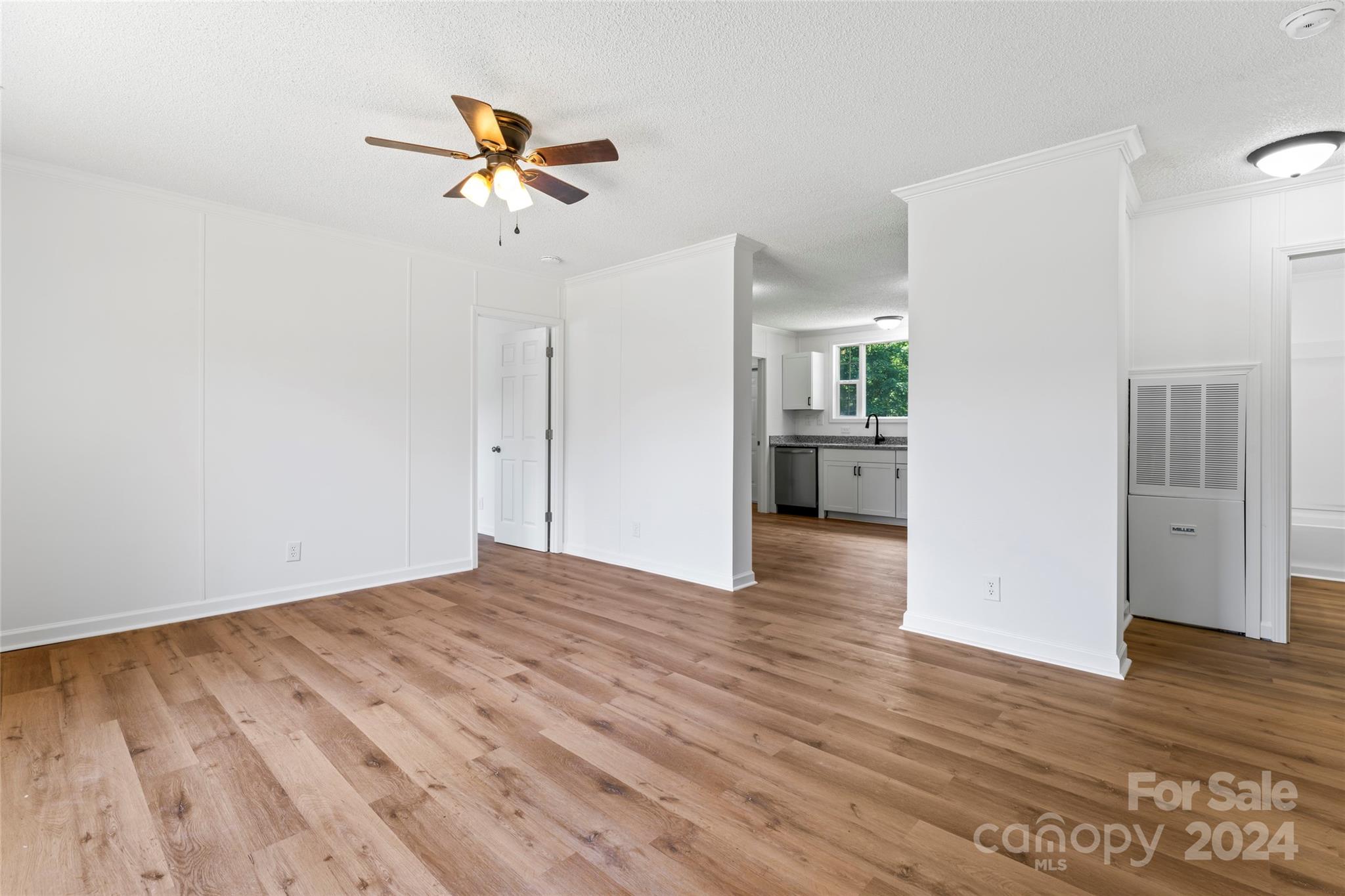 669 Ross Road Lincolnton, NC 28092 - Photo 5 of 30 a view of an empty room with wooden floor