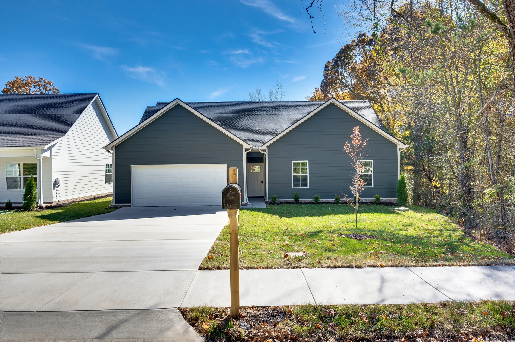 7107 Wiley Circle Fairview, TN 37062 - Photo 2 of 27 a front view of a house with a yard