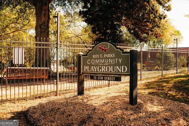 a view of swimming pool with outdoor seating and yard