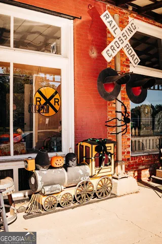 a view of a chair and table in the patio