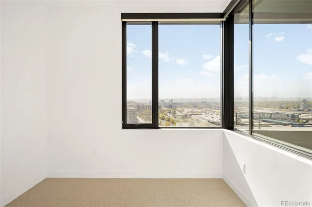 a view of a room next to a window