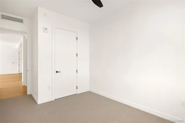 a bathroom with a tub and a shower