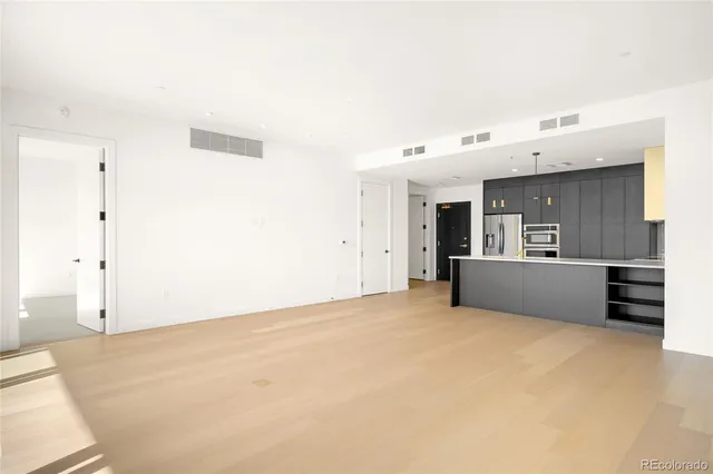a view of a kitchen with a sink