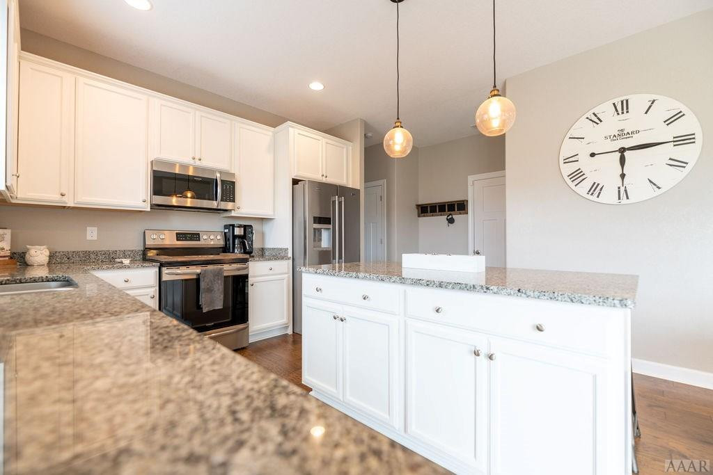 107 Rosedale Court Moyock, NC 27958 - Photo 11 of 31 Pendant lighting and lots of countertop space