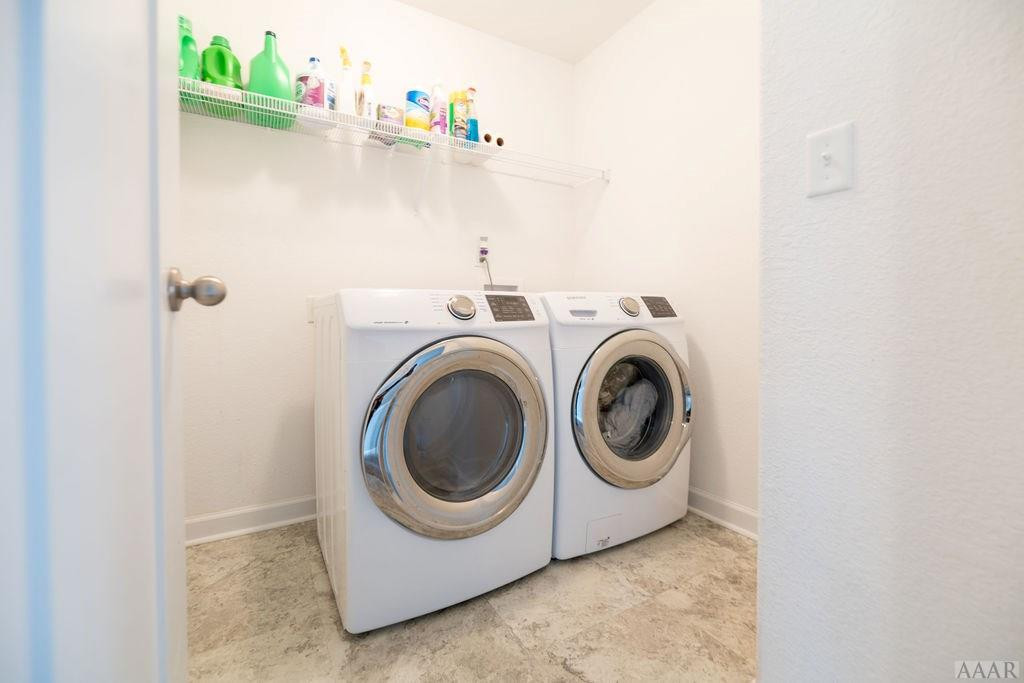 107 Rosedale Court Moyock, NC 27958 - Photo 14 of 31 Laundry Room has lots of space