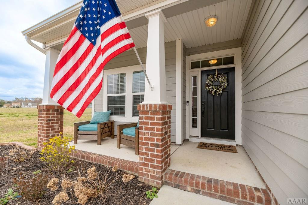 107 Rosedale Court Moyock, NC 27958 - Photo 3 of 31 Craftsman style columns add curb appeal
