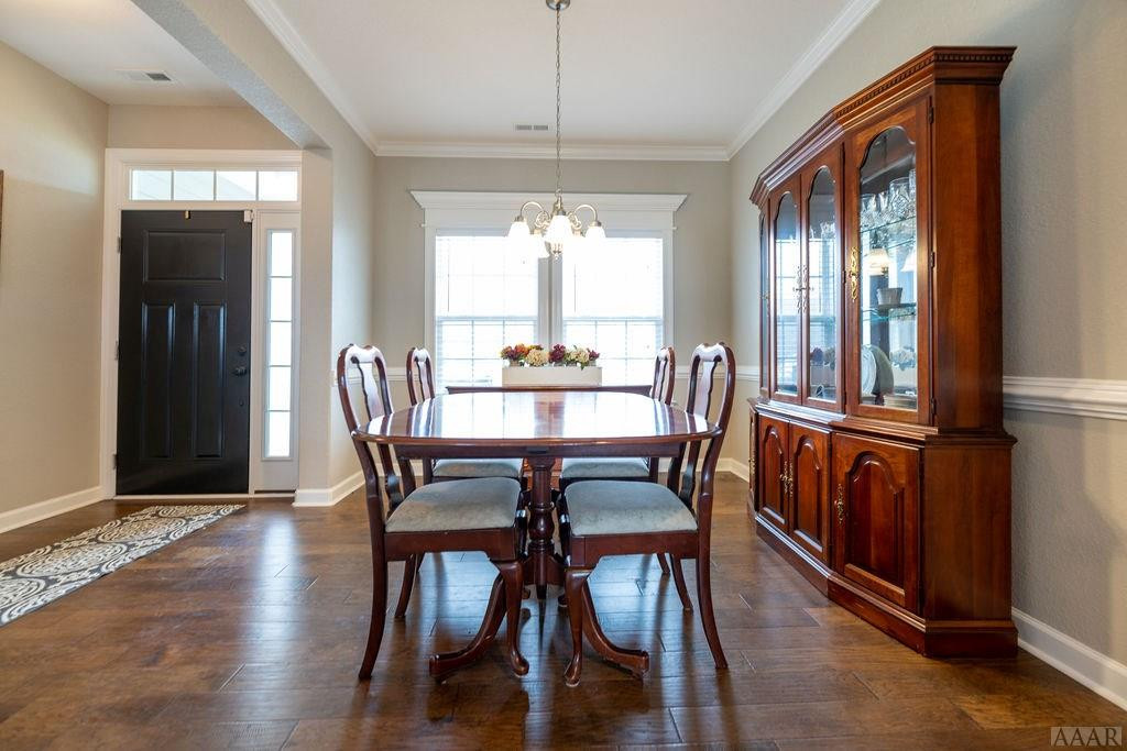 107 Rosedale Court Moyock, NC 27958 - Photo 4 of 31 Dining Room with hardwood floors