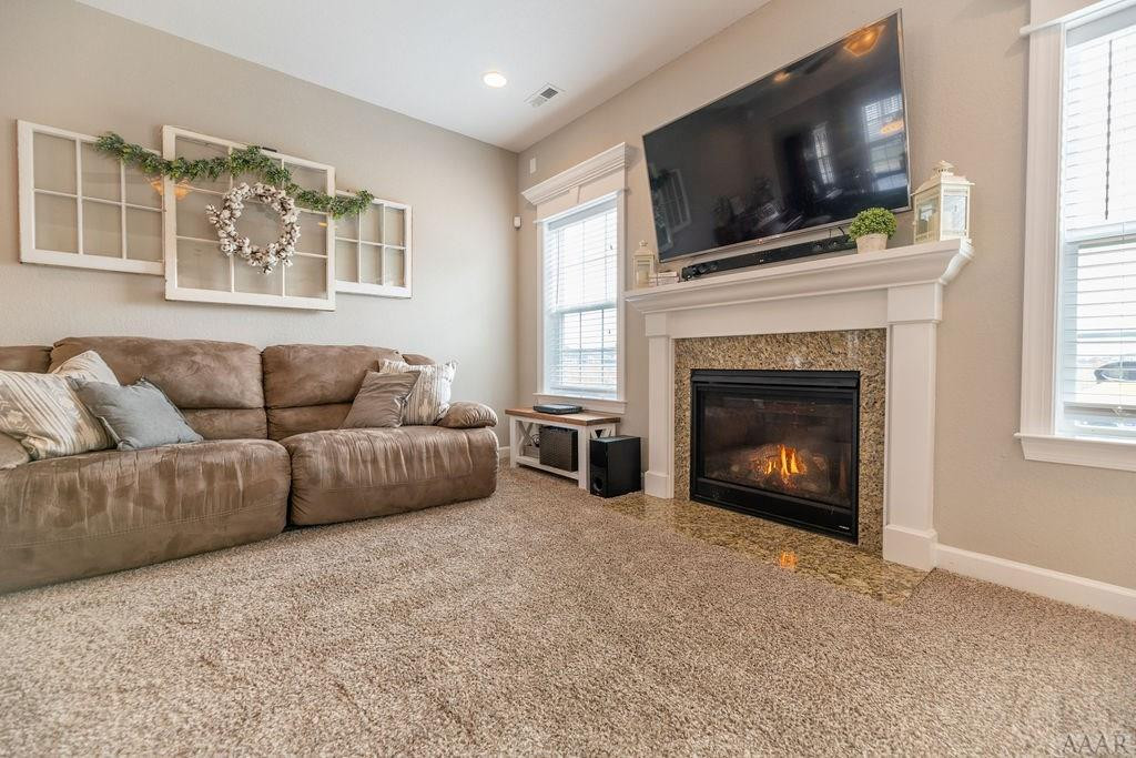107 Rosedale Court Moyock, NC 27958 - Photo 7 of 31 Inviting fireplace and handsome mantel