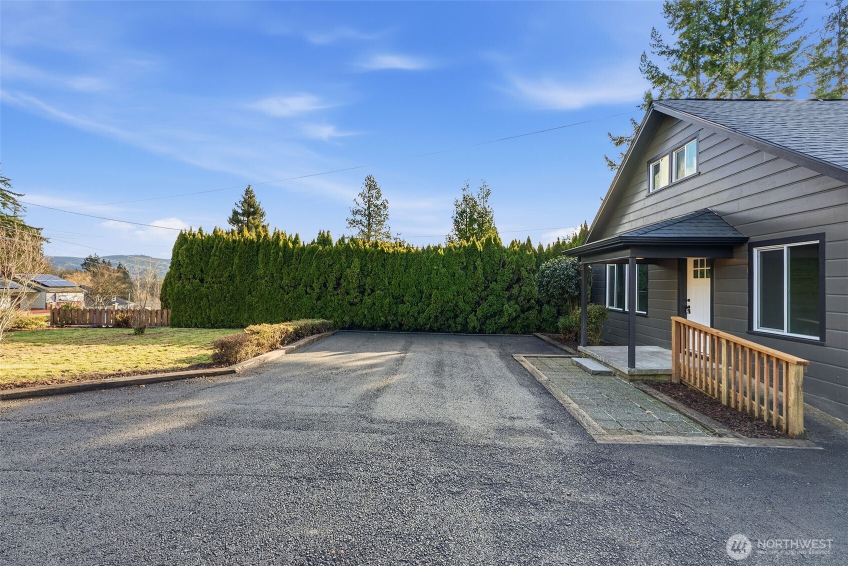 508 Nevada Drive Longview, WA 98632 - Photo 4 of 29 a view of a house with a yard and ocean view