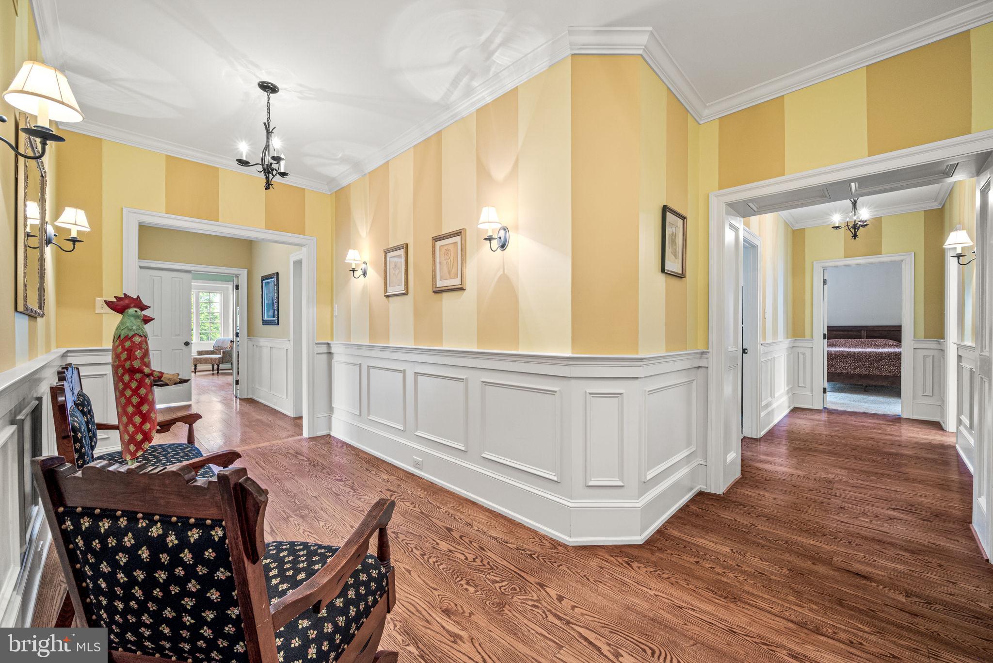 1548 Morstein Road Malvern, PA 19355 - Photo 45 of 80 a living room with furniture and a chandelier