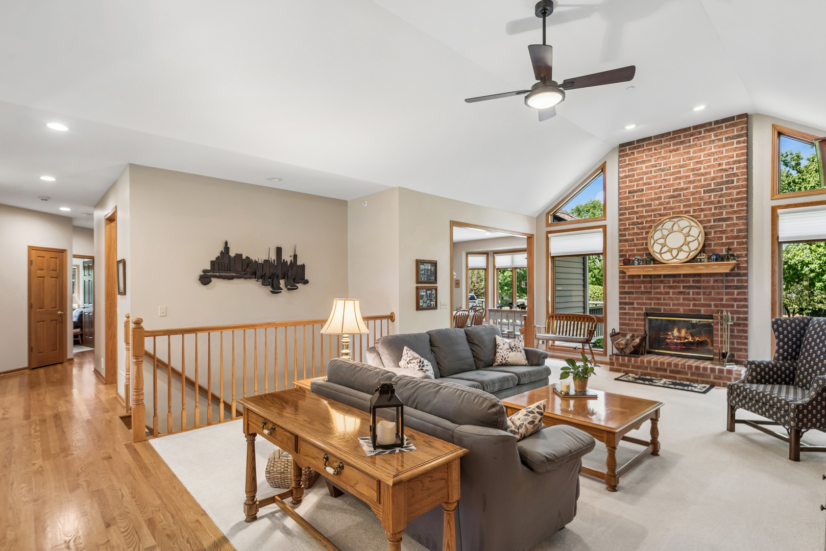 10907 Red Hawk Lane Spring Grove, IL 60071 - Photo 12 of 44 a living room with furniture and a wooden floor