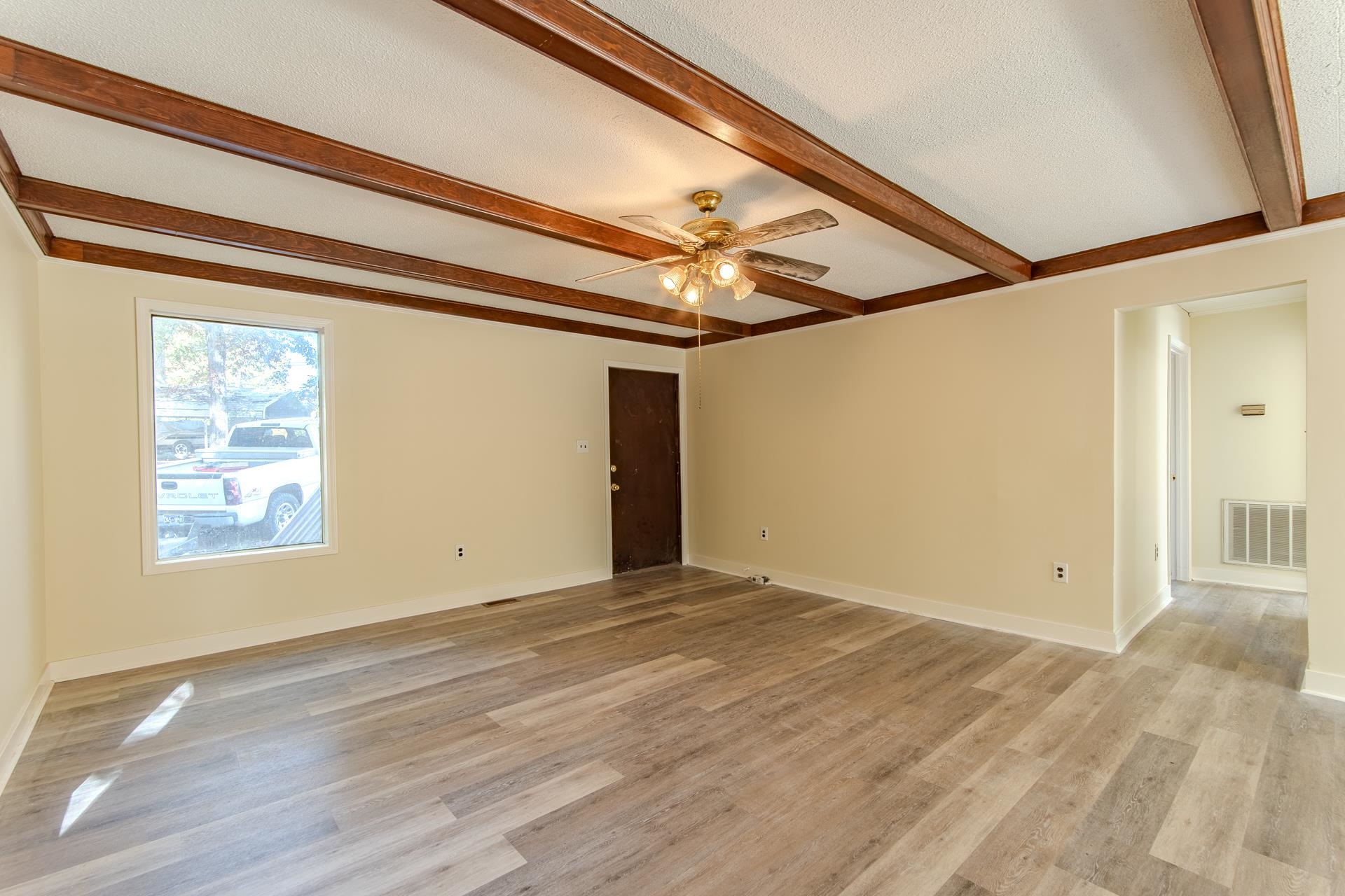 35 Trail Lane Savannah, TN 38372 - Photo 13 of 39 a view of a room with wooden floor and windows
