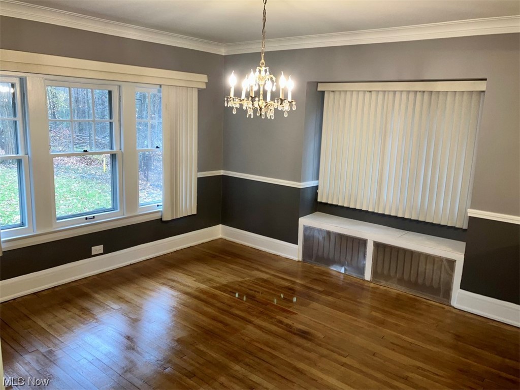 2108 Volney Road Youngstown, OH 44511 - Photo 7 of 27 Featuring ornamental molding, and dark hardwood / wood-style flooring