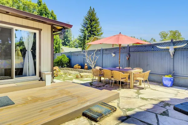 a view of a house with porch and sitting area