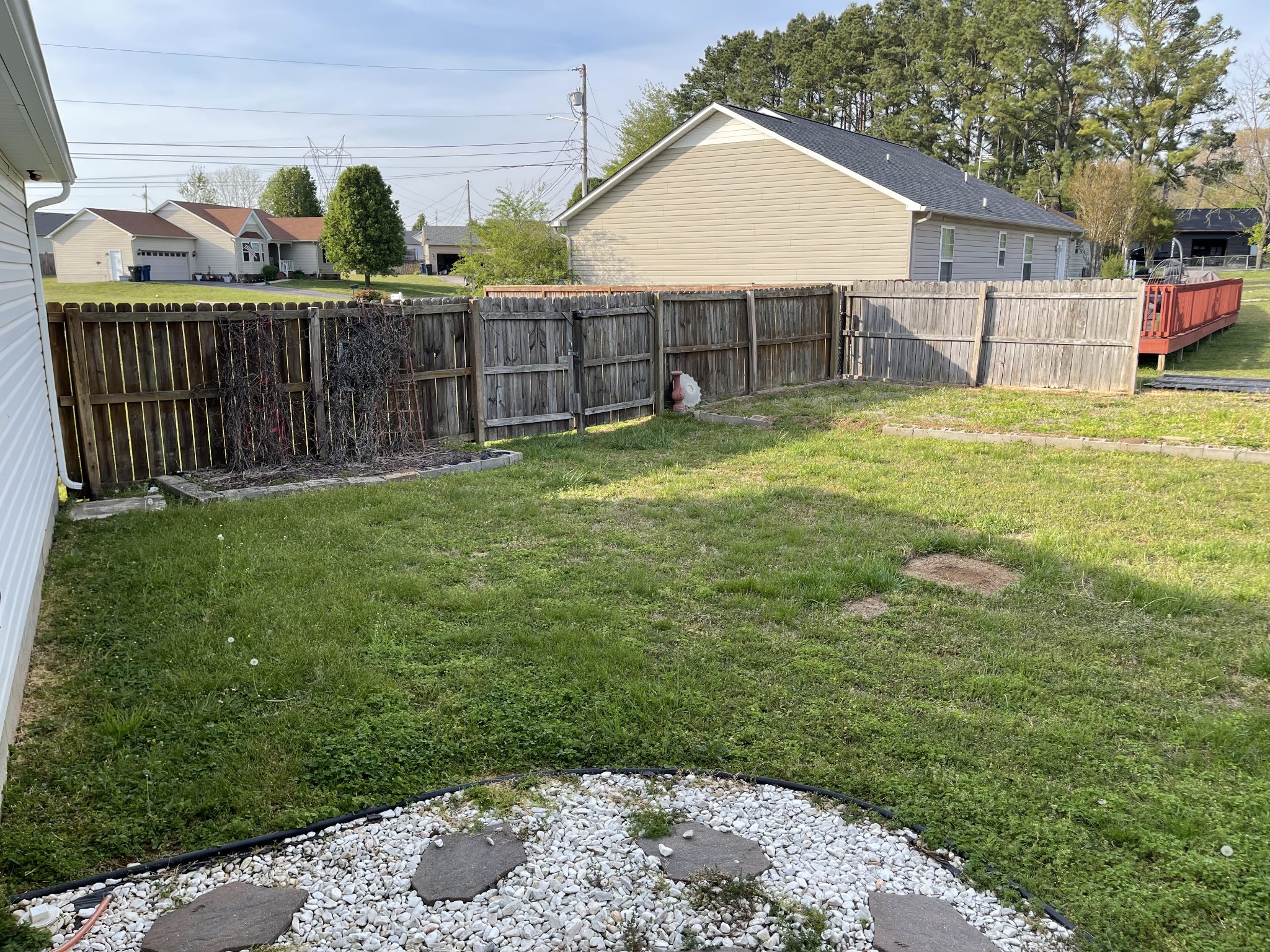 1610 Robert Road Columbia, TN 38401 - Photo 23 of 25 a view of a backyard with a garden and plants