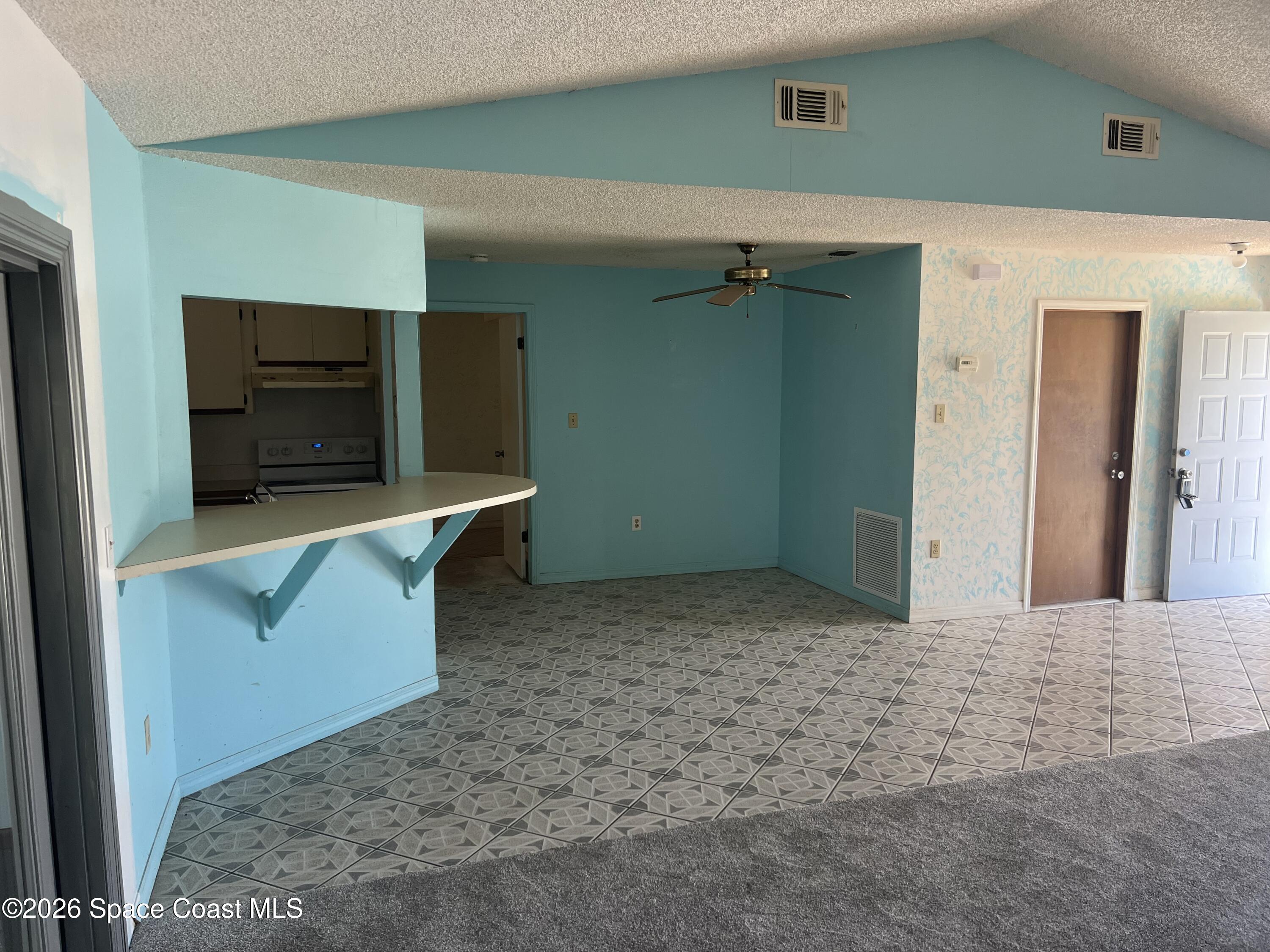 1766 Sand Road Southeast Palm Bay, FL 32909 - Photo 5 of 13 a view of a hallway with entryway