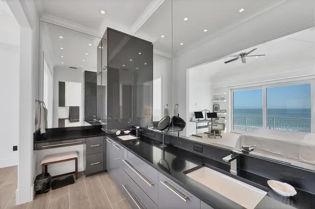 a bedroom with a balcony a bed and a couch