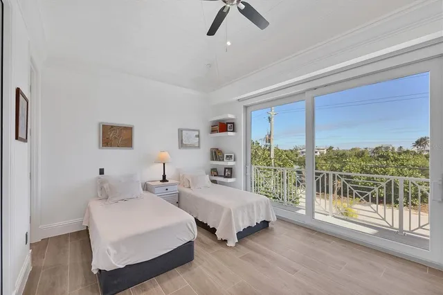 a kitchen with a refrigerator and a sink