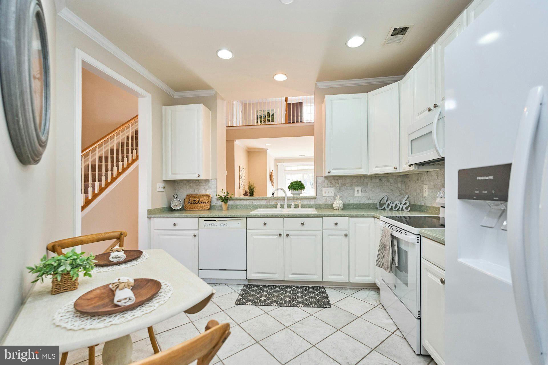 6916 Broadleaf Terrace Gainesville, VA 20155 - Photo 11 of 40 Gourmet Kitchen with soft white Cabinets