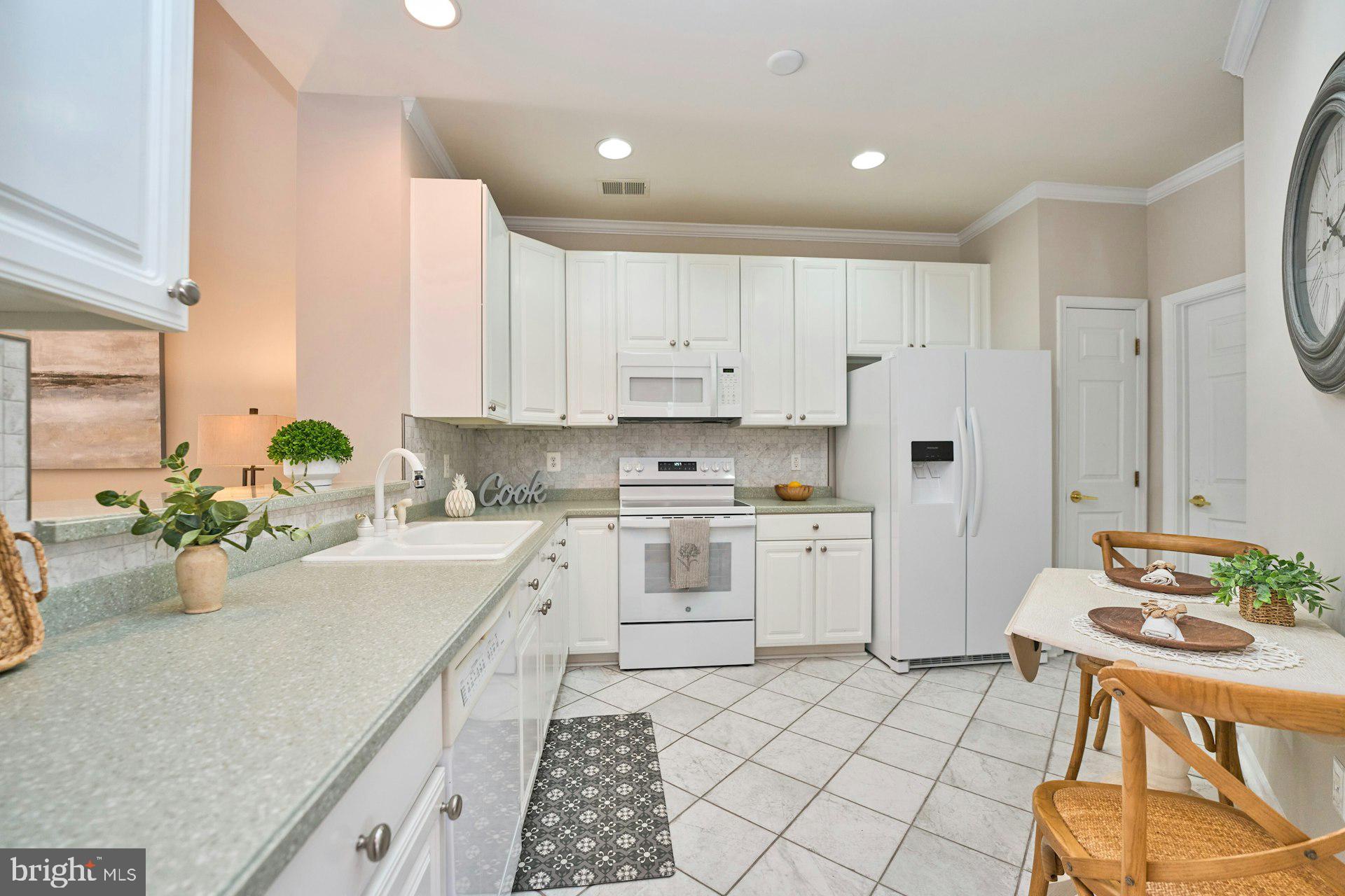 6916 Broadleaf Terrace Gainesville, VA 20155 - Photo 12 of 40 Ceramic tile flooring and recessed lighting