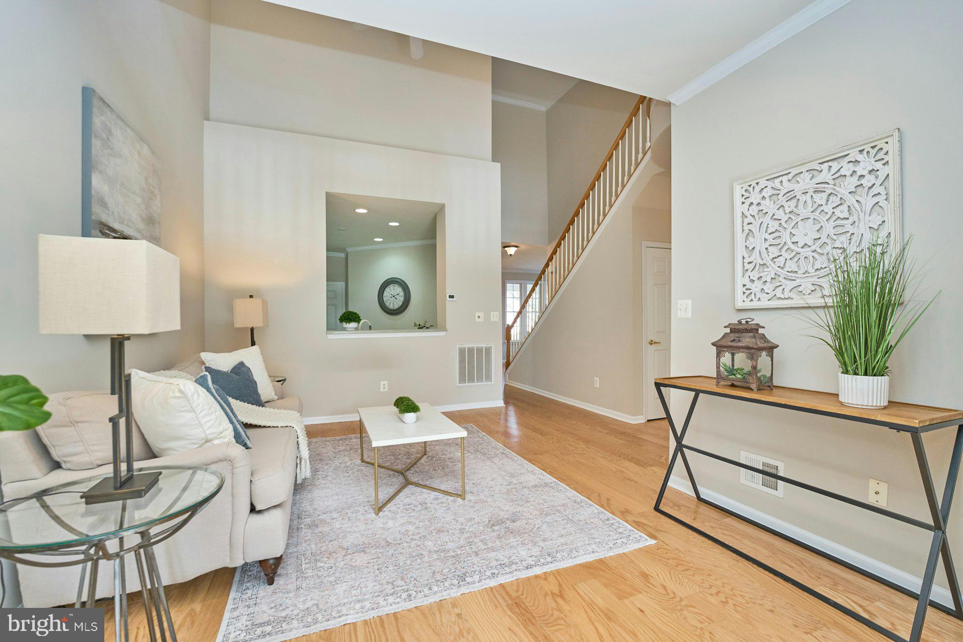 6916 Broadleaf Terrace Gainesville, VA 20155 - Photo 14 of 40 Family Room with Hardwood Flooring