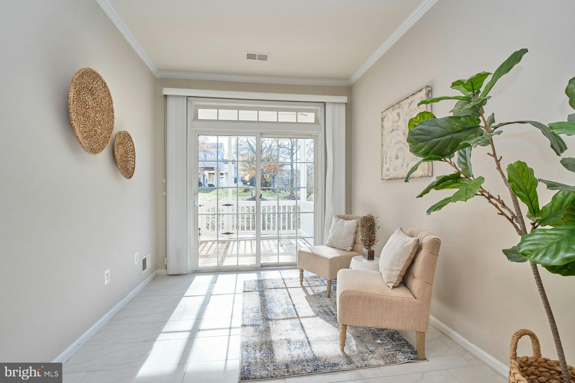 6916 Broadleaf Terrace Gainesville, VA 20155 - Photo 17 of 40 New Ceramic tile in Sunroom leading to deck