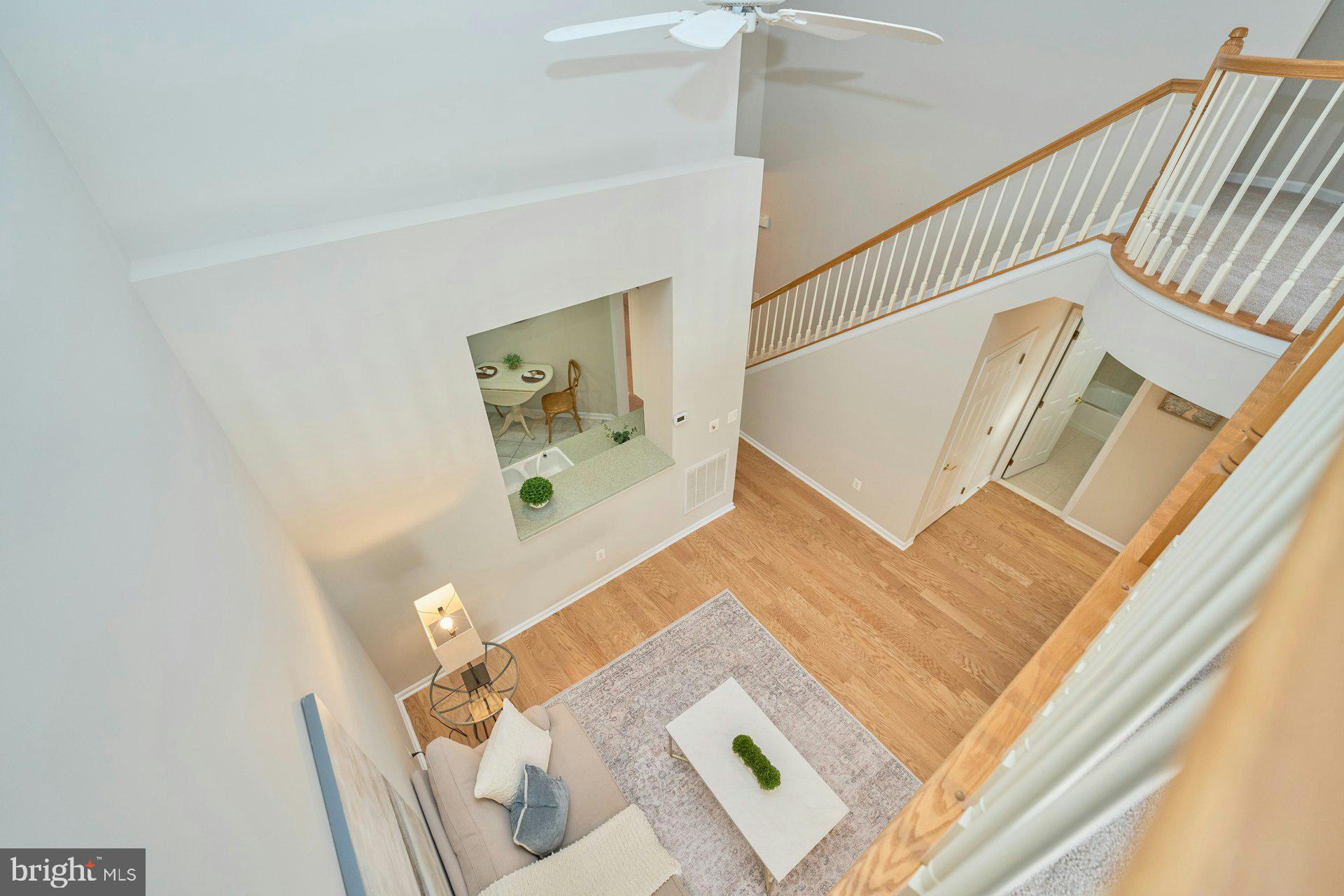 6916 Broadleaf Terrace Gainesville, VA 20155 - Photo 26 of 40 Overlook into Family Room