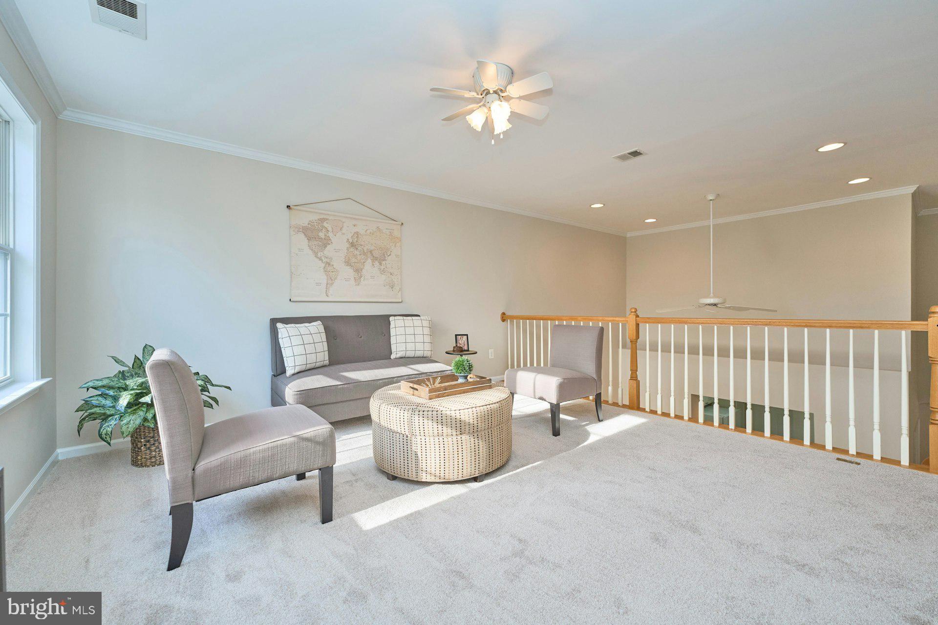 6916 Broadleaf Terrace Gainesville, VA 20155 - Photo 27 of 40 Loft area with another ceiling fan