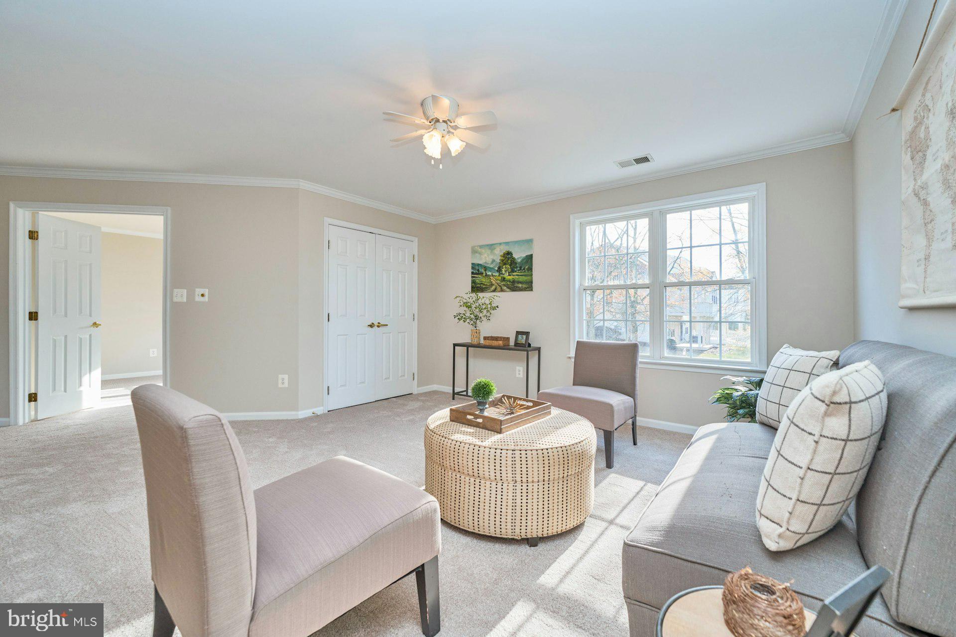 6916 Broadleaf Terrace Gainesville, VA 20155 - Photo 29 of 40 Loft are with wall of windows