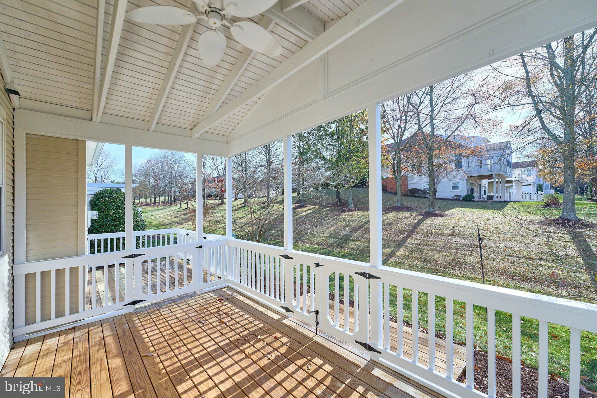 6916 Broadleaf Terrace Gainesville, VA 20155 - Photo 34 of 40 Covered Deck with ceiling fan and trex flooring