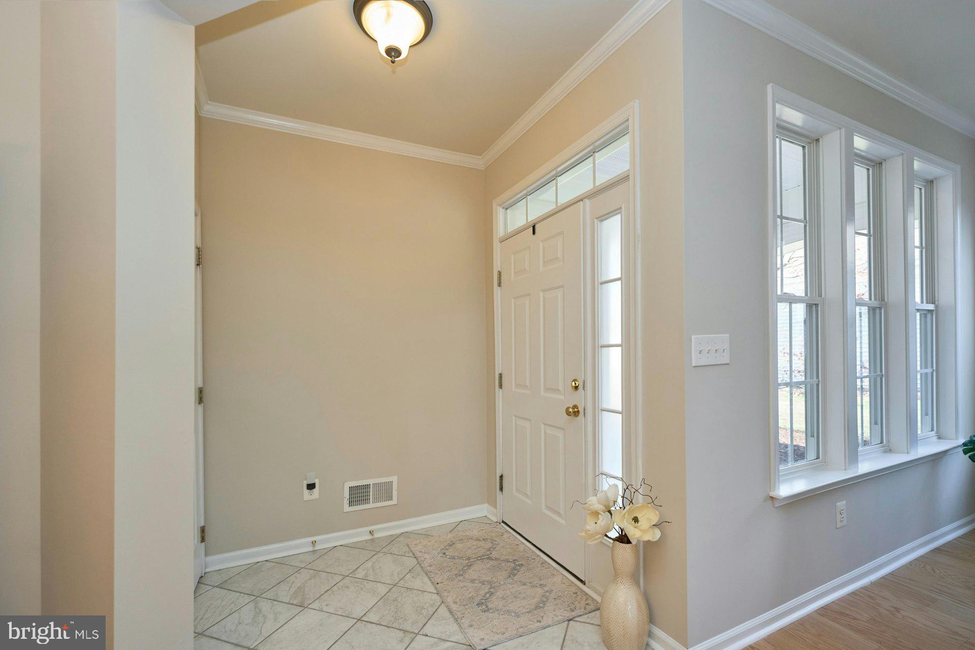 6916 Broadleaf Terrace Gainesville, VA 20155 - Photo 4 of 40 Foyer and large Coat Closet