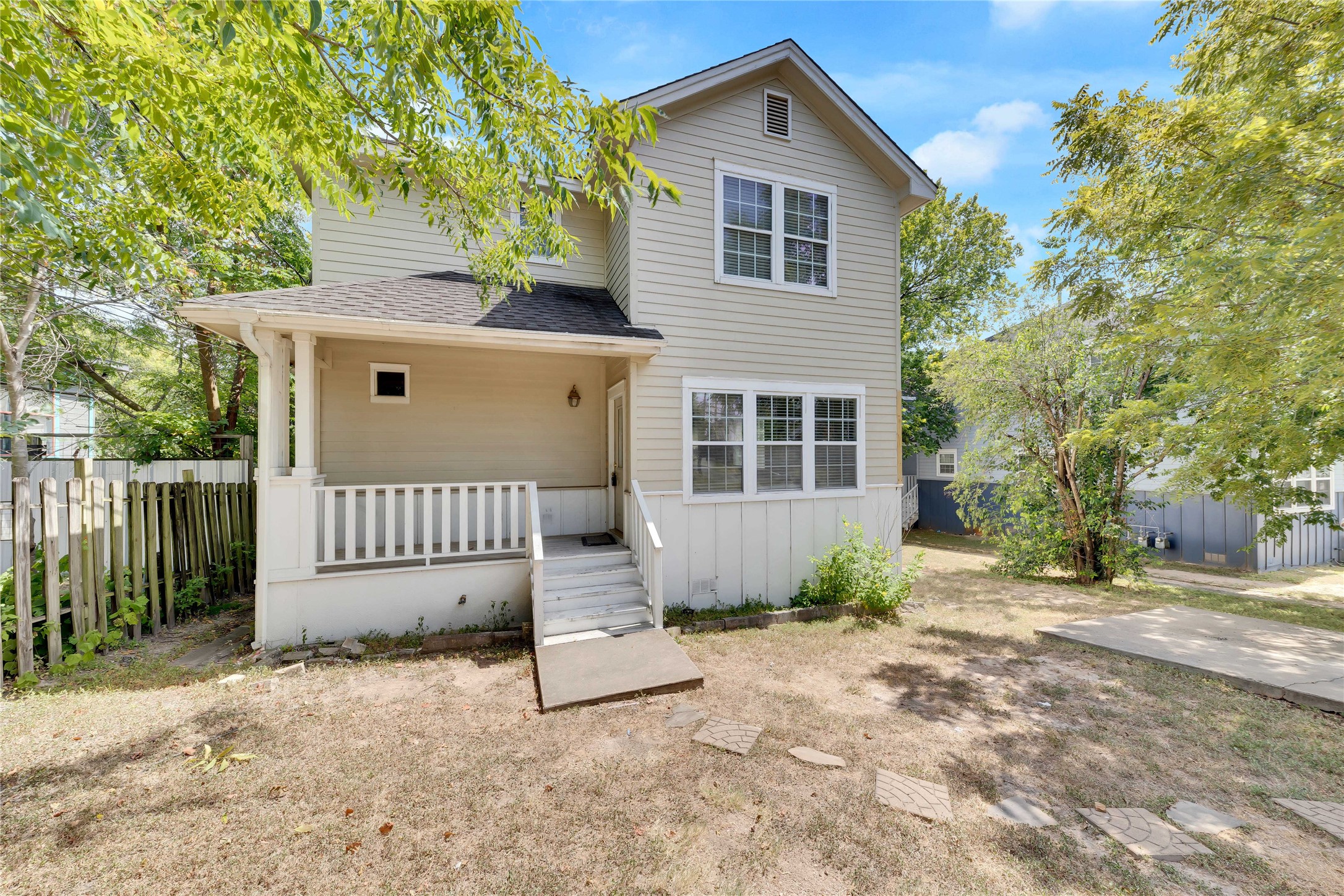 2201 East 18th Street, Unit B Austin, TX 78702 - Photo 22 of 25 A charming two-story home with a welcoming front porch and a private yard.