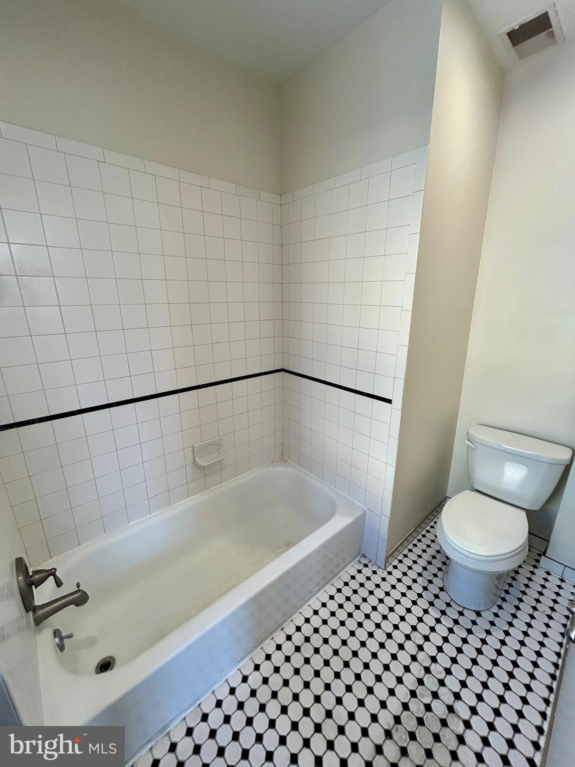 101 Fayette Street, Unit 2 Conshohocken, PA 19428 - Photo 14 of 19 a bathroom with a bathtub and a toilet