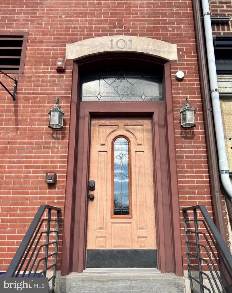 101 Fayette Street, Unit 2 Conshohocken, PA 19428 - Photo 3 of 19 a view of building with a door