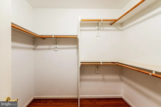 a view of an empty walk in closet
