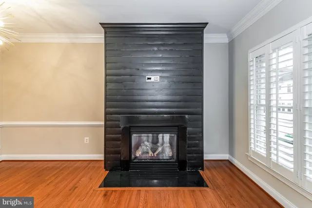a living room with a fireplace