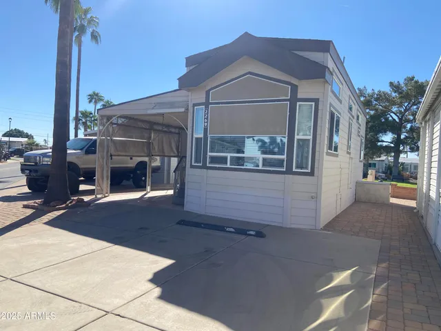 a front view of a house with a garage