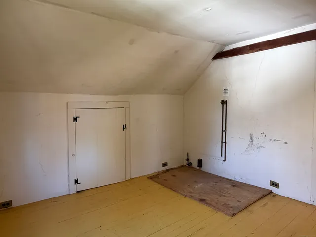 a aerial view of a house with a yard