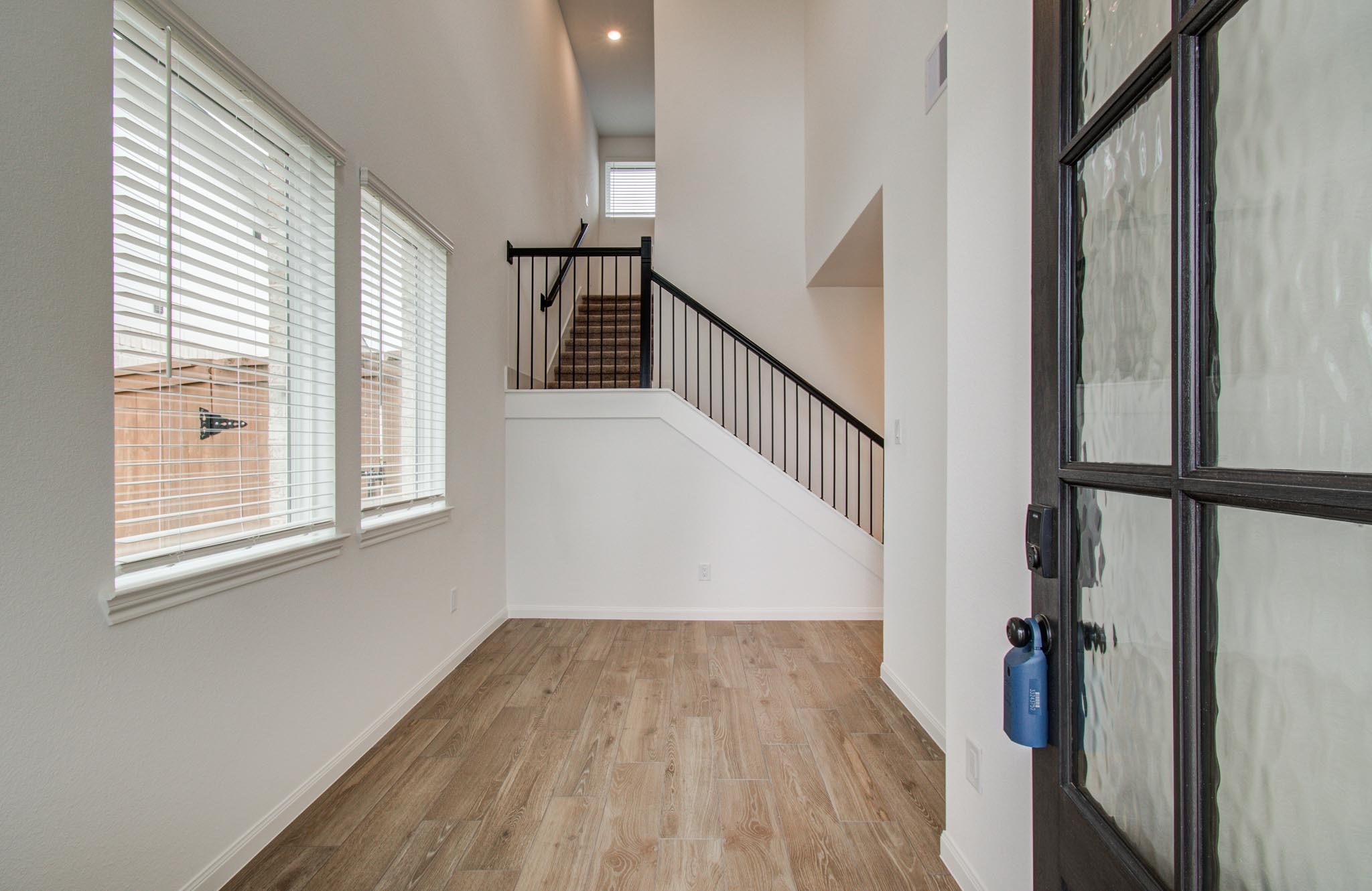 7231 Yarrow Blossom Court Katy, TX 77493 - Photo 12 of 49 a view of entryway and hall with wooden floor