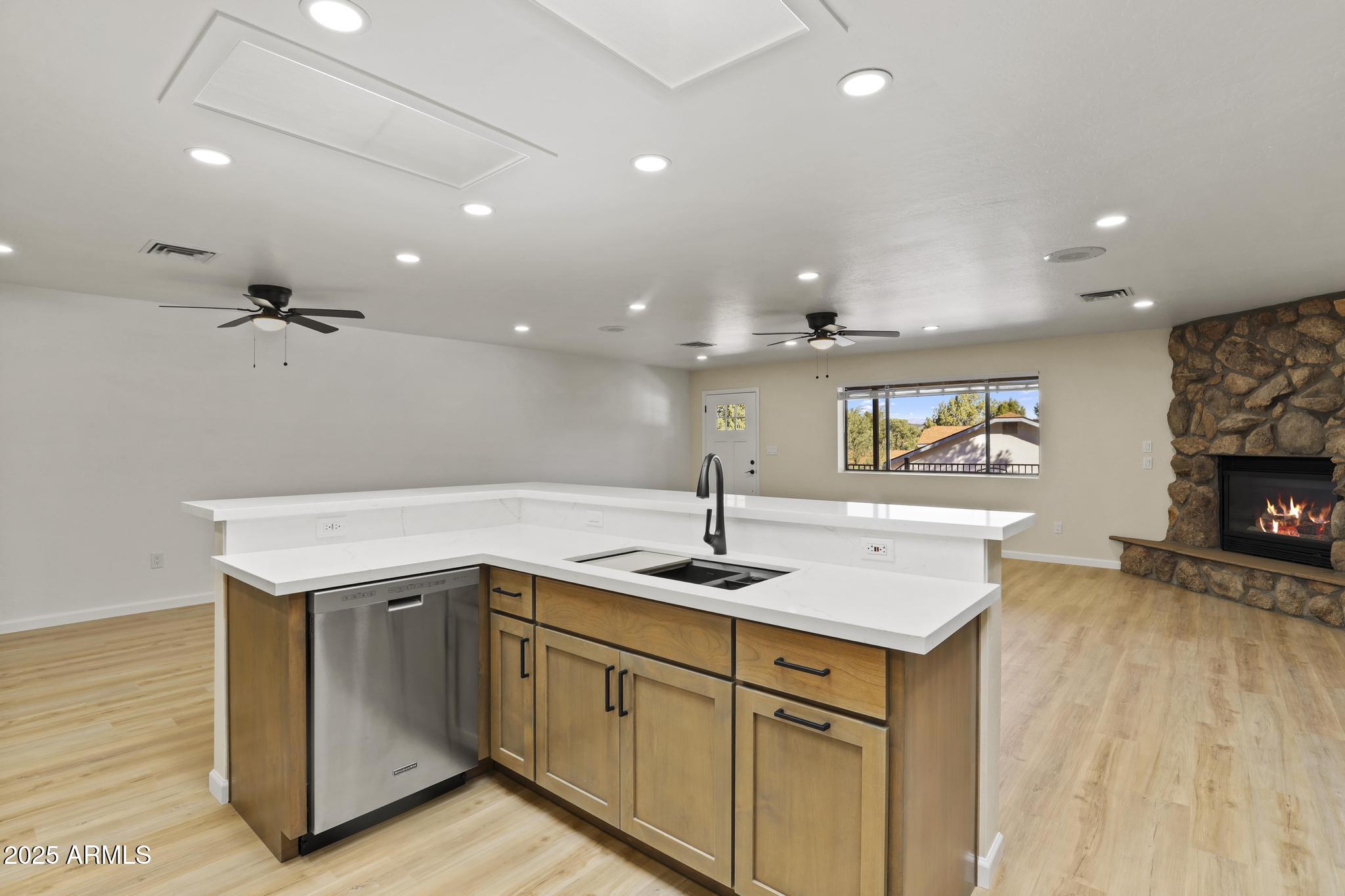 625 East Coronado Way Payson, AZ 85541 - Photo 6 of 25 a kitchen that has a sink a stove and a wooden floor