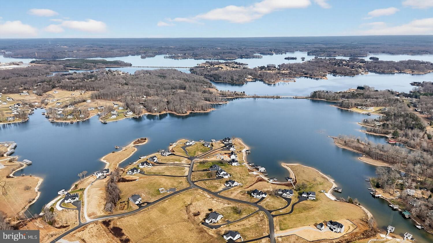 393 Rock Island Ridge Mineral, VA 23117 - Photo 93 of 97 an aerial view of a house with a lake view