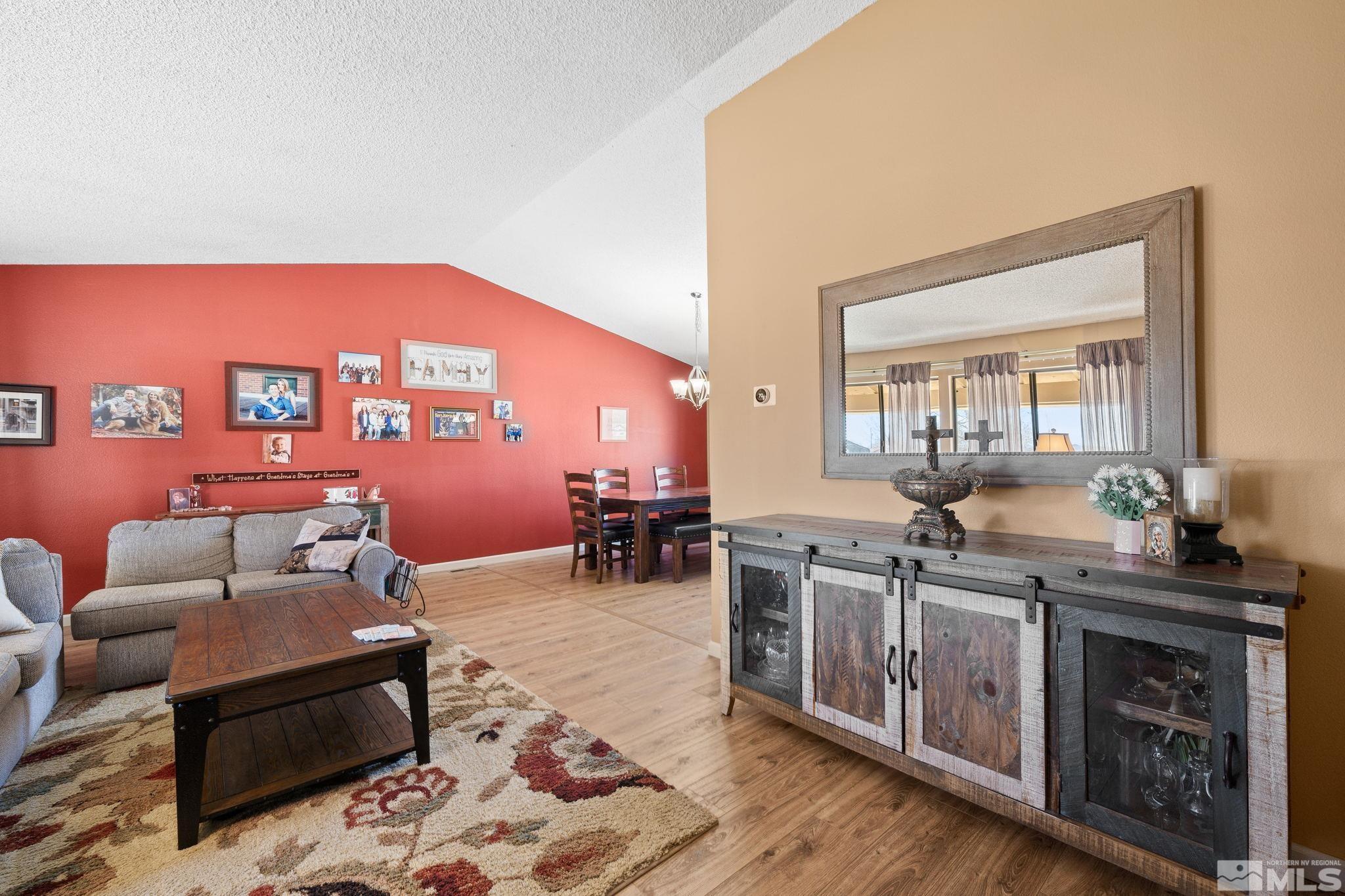 1629 Tumbleweed Road Fallon, NV 89406 - Photo 8 of 39 a living room with furniture and a wooden floor