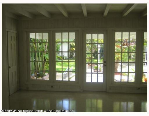 312 Sunset Road West Palm Beach, FL 33401 - Photo 3 of 8 a view of an empty room with a window