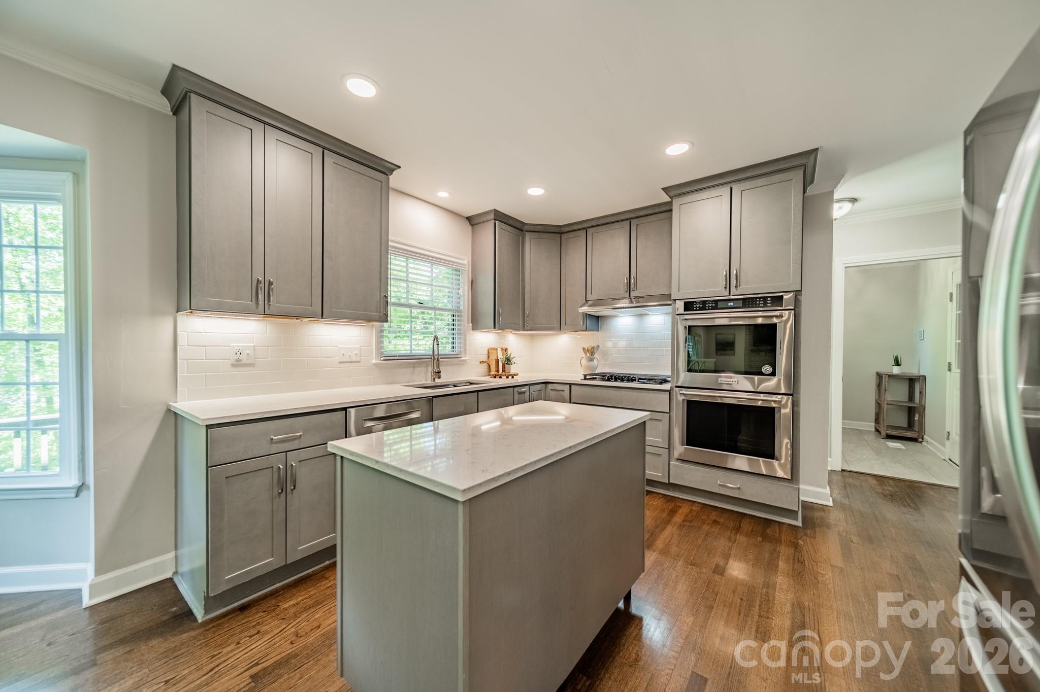 231 South Downs Way Fort Mill, SC 29708 - Photo 17 of 48 a kitchen with appliances cabinets and a sink
