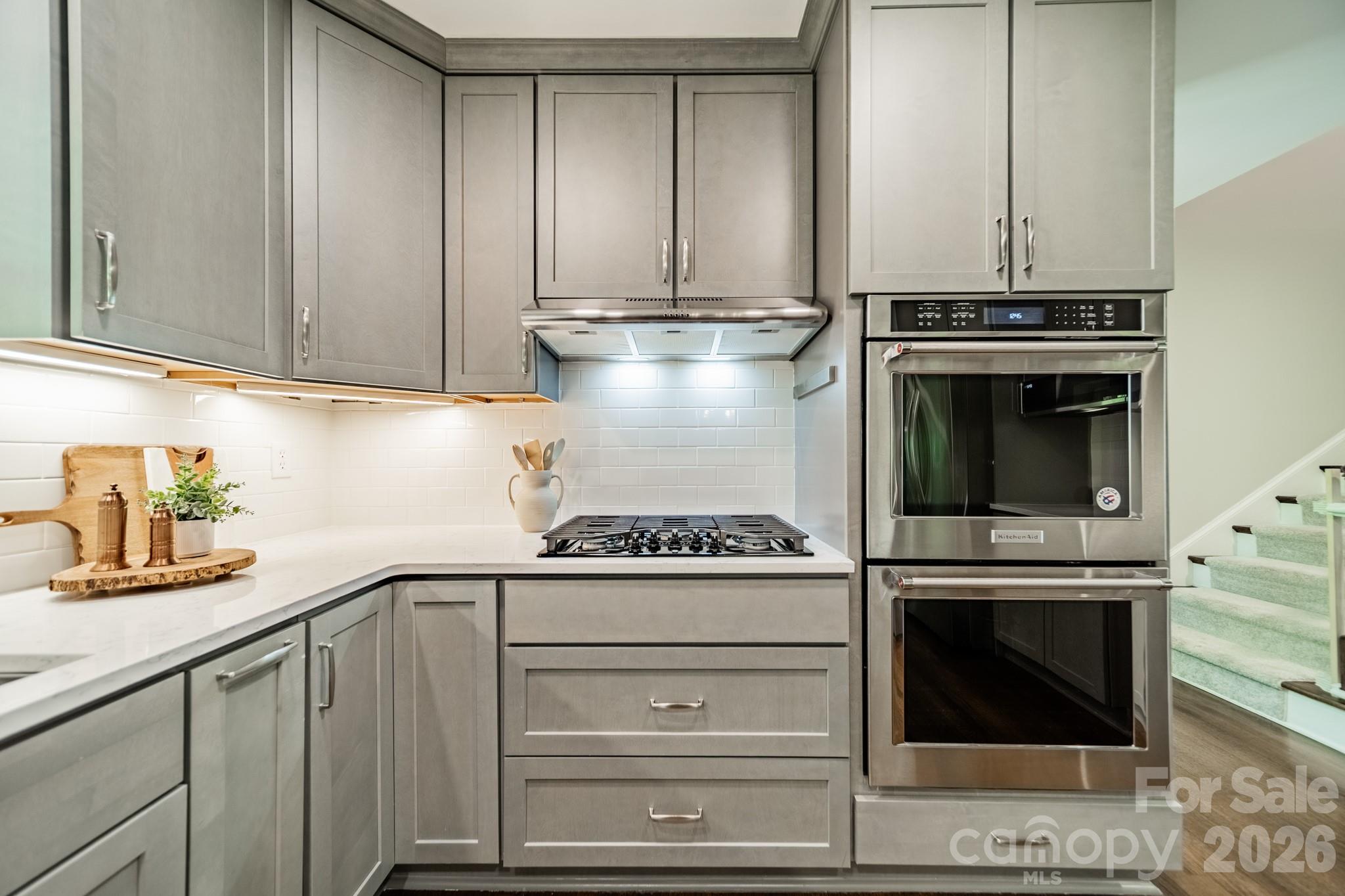 231 South Downs Way Fort Mill, SC 29708 - Photo 19 of 48 a stove top oven sitting inside of a kitchen