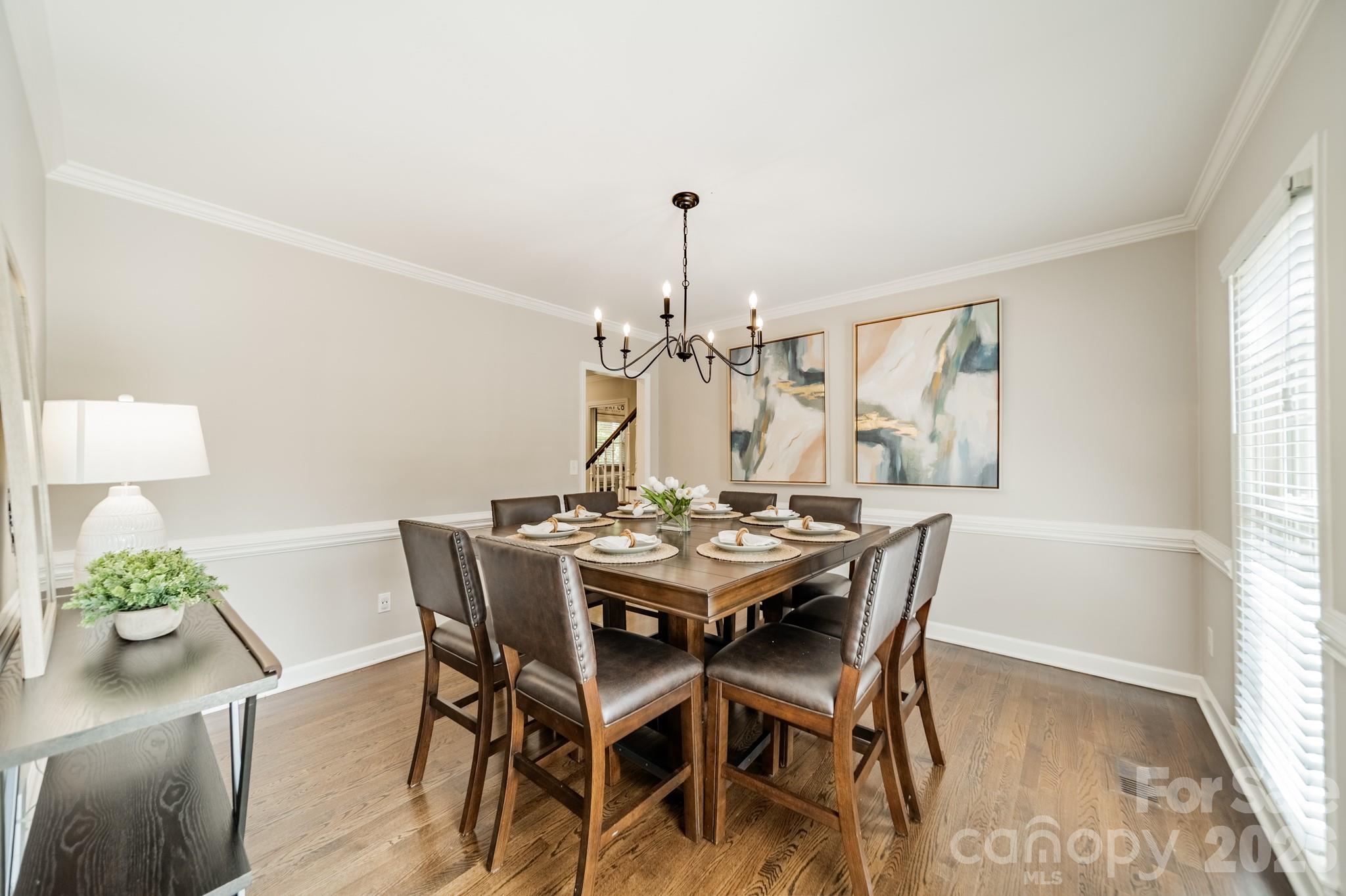 231 South Downs Way Fort Mill, SC 29708 - Photo 22 of 48 a view of a dining room with furniture window and wooden floor