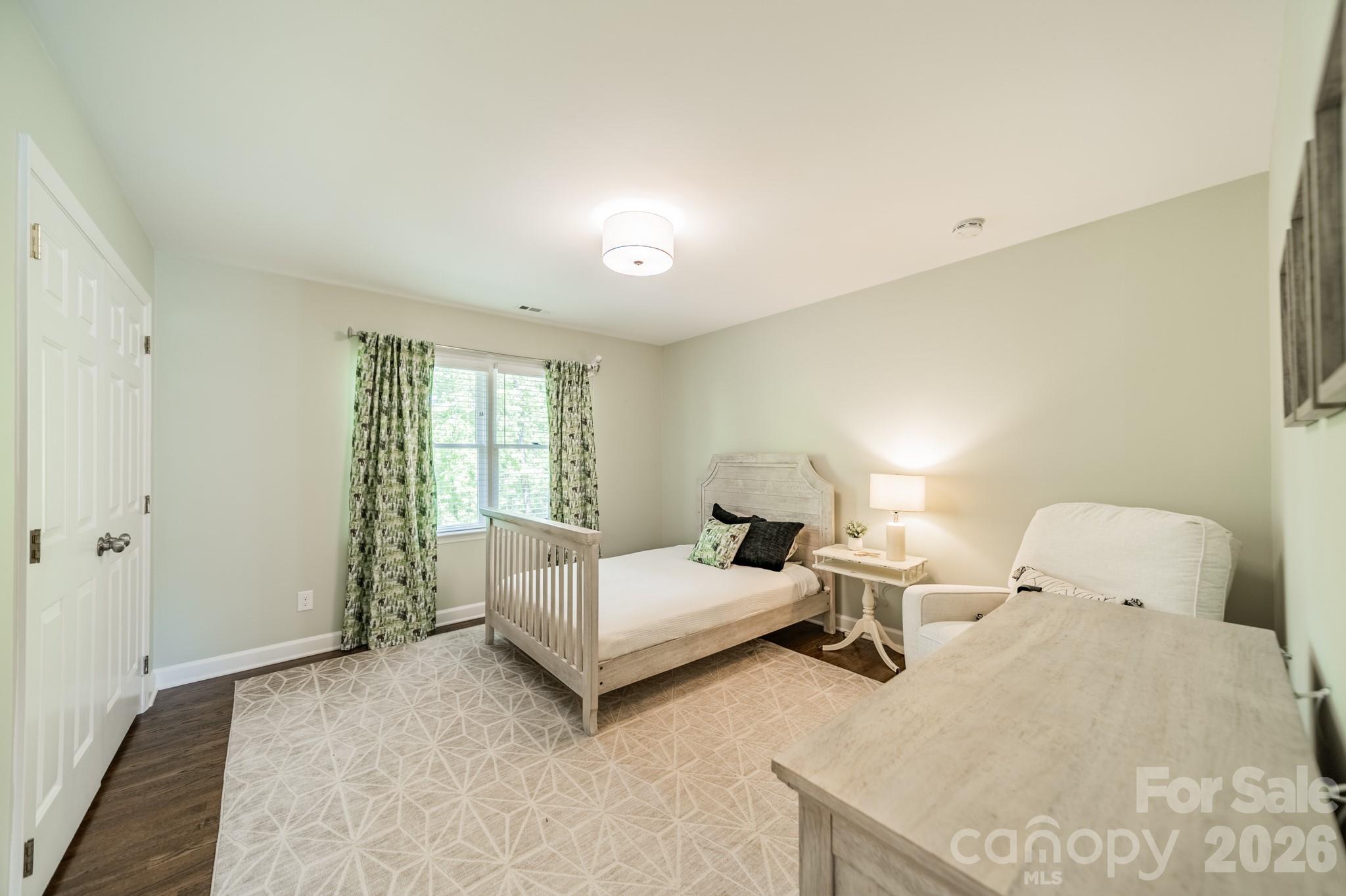 231 South Downs Way Fort Mill, SC 29708 - Photo 35 of 48 a bedroom with a bed and lamp