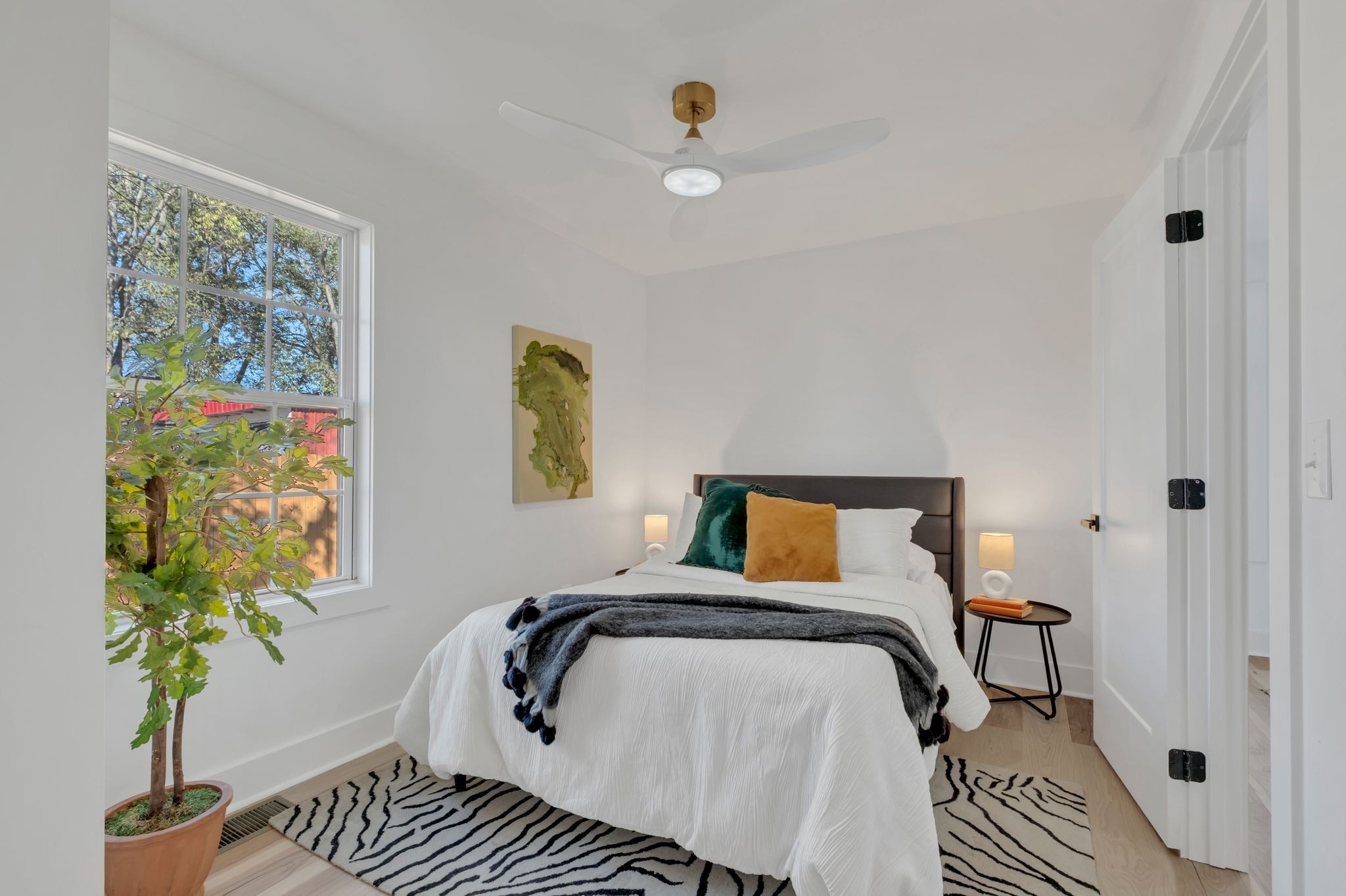 568 West Campbell Road Goodlettsville, TN 37072 - Photo 12 of 27 a bedroom with a bed and a window